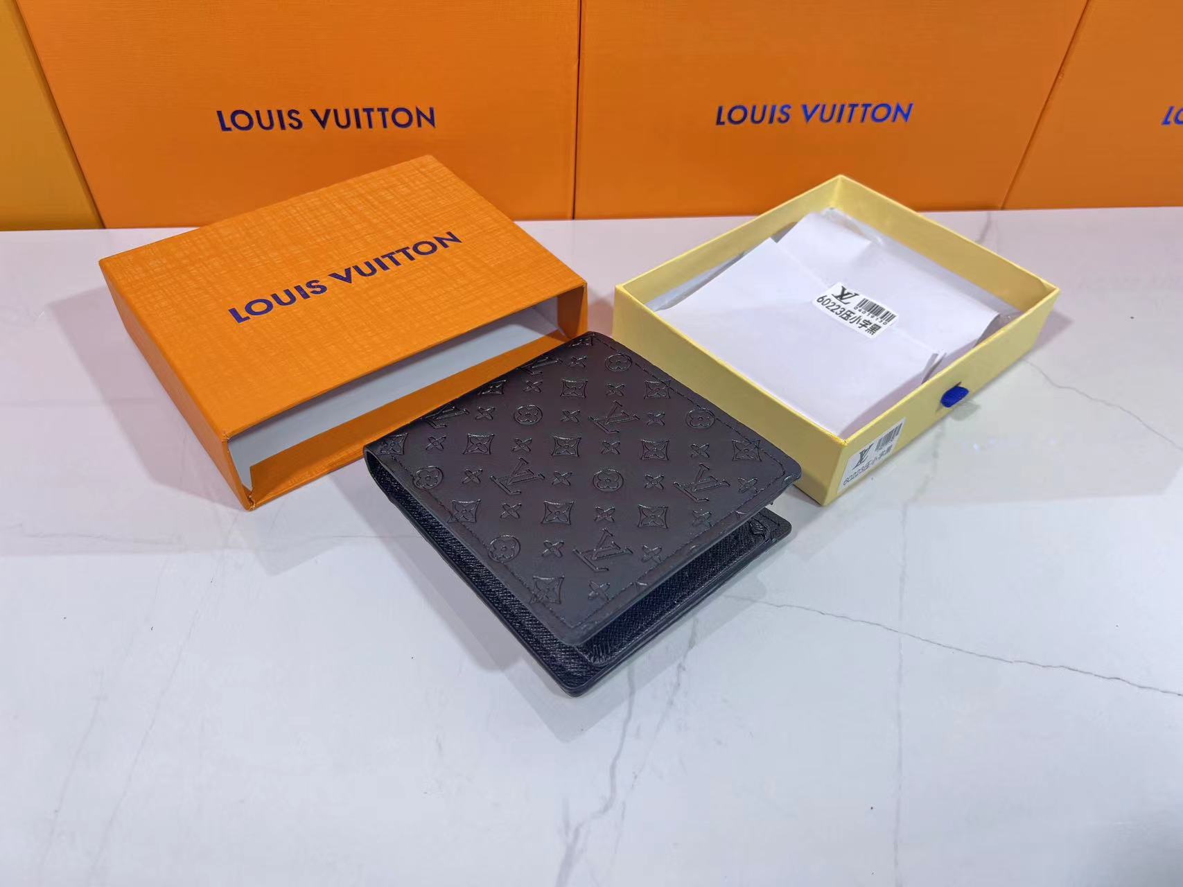 Printed wallet with all-over printing of small flowers