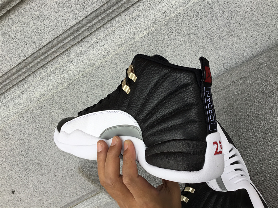 Air Jordan 12 playoffs black and white silver buckle