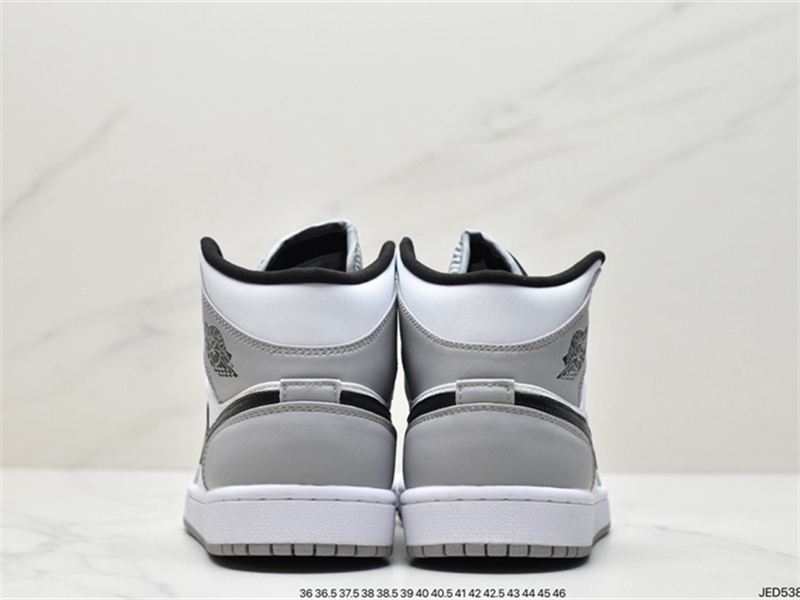 Air Jordan 1 Mid black and white purple