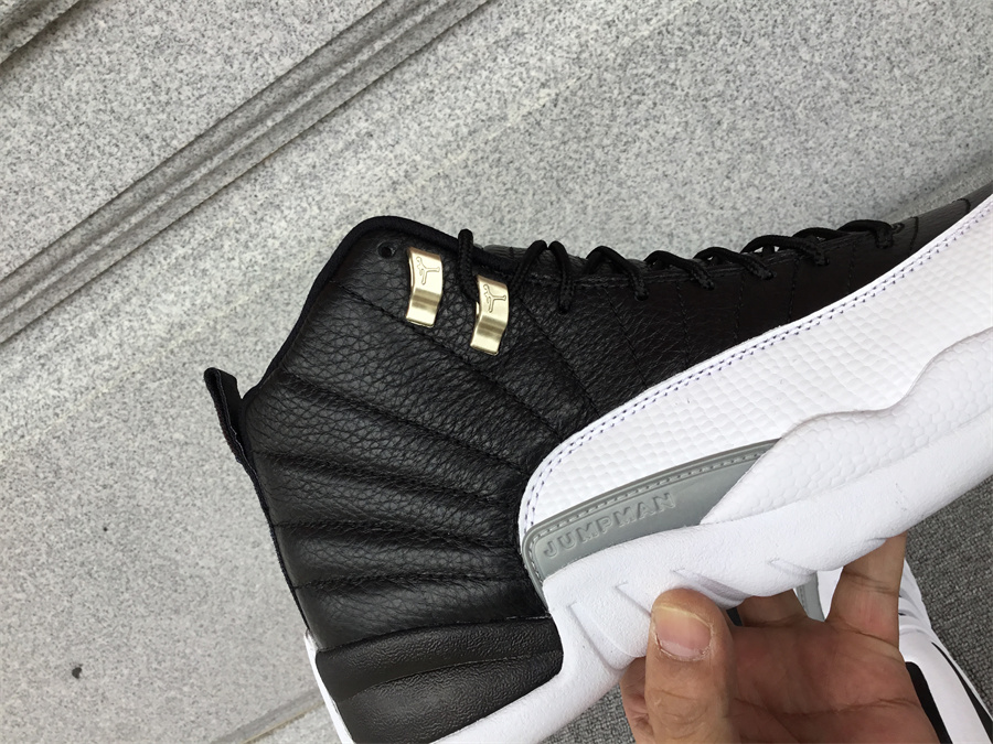 Air Jordan 12 playoffs black and white silver buckle