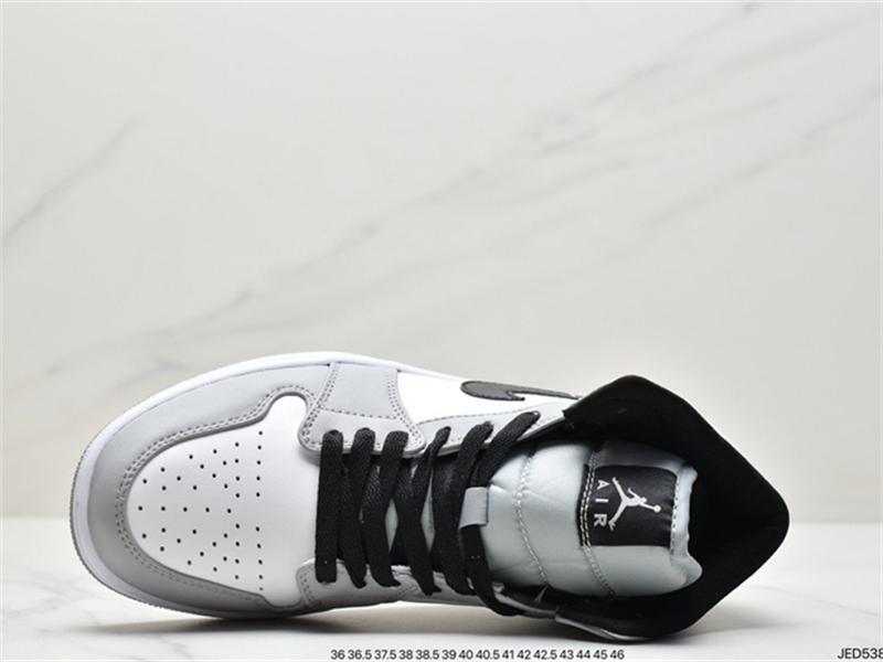 Air Jordan 1 Mid black and white purple