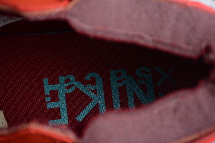 KAWS x sacai x Blazer Low Team Red DM7901-600