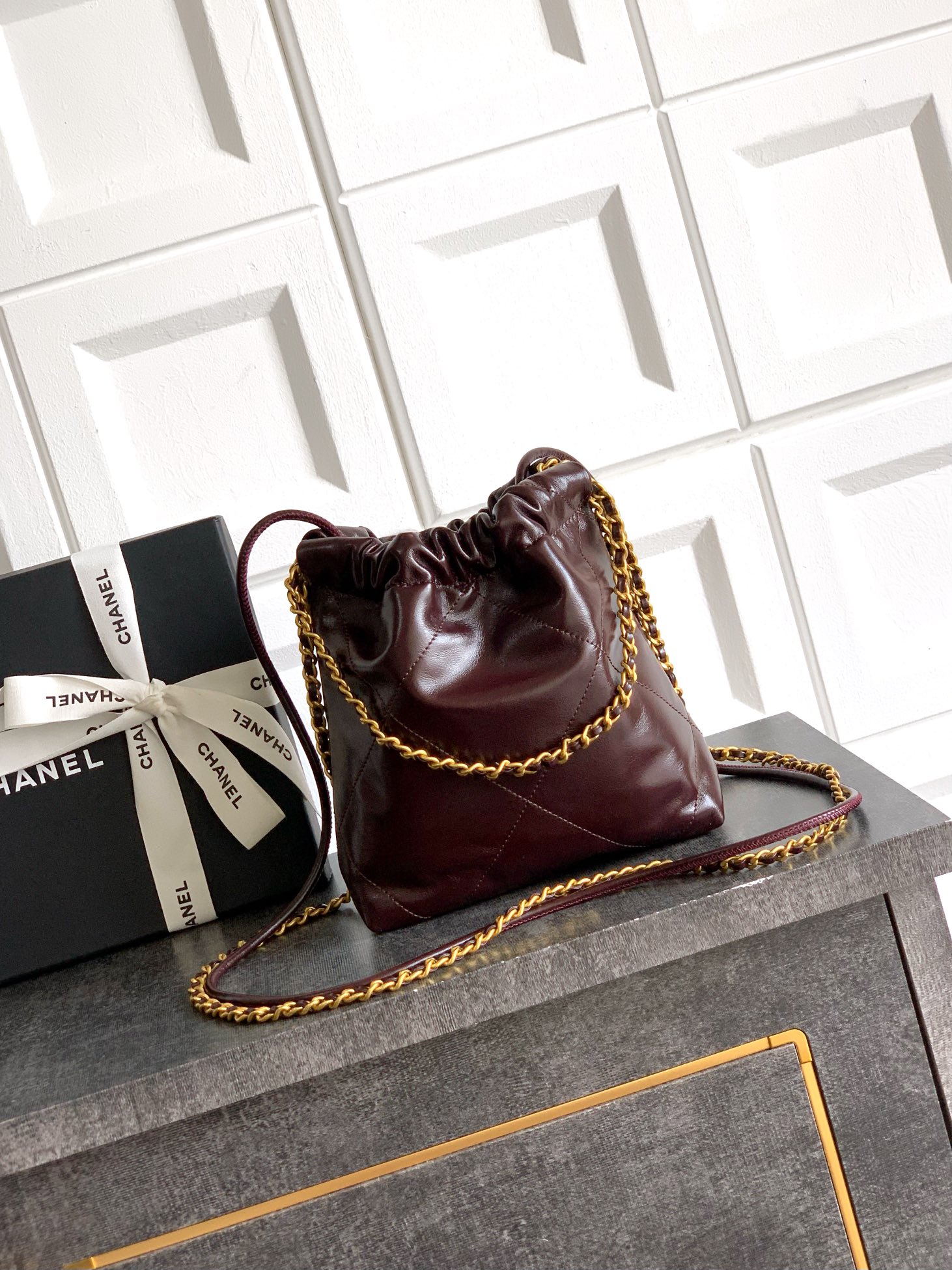 CHANEL 22 Handbag Shiny Calfskin & Gold-Tone Metal Dark Brown