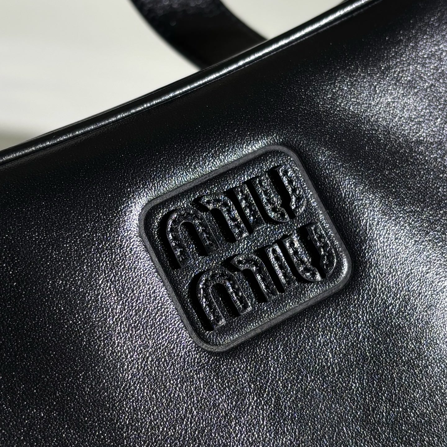 MIUMIU Leather top-handle bag