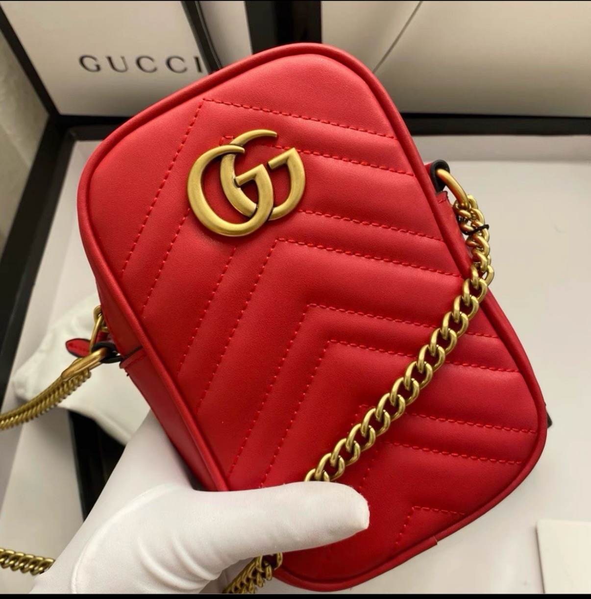 GUCCI GG Marmont mini quilted leather pouch