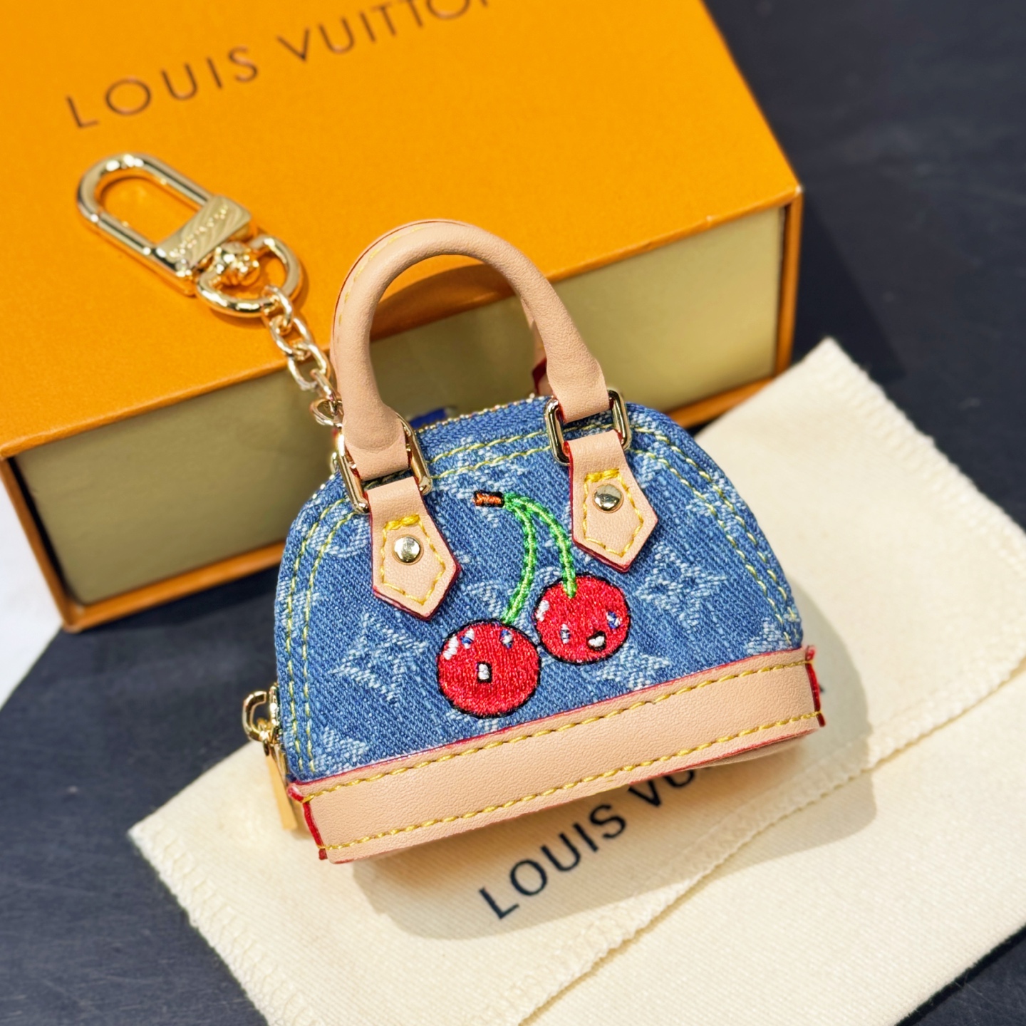 M02535 LV x TM Micro Denim Cerise Bag Charm