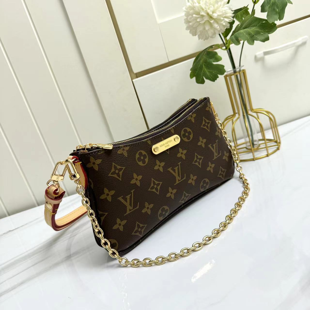 Louis Vuitton Monogram M83008 Liv Pochette