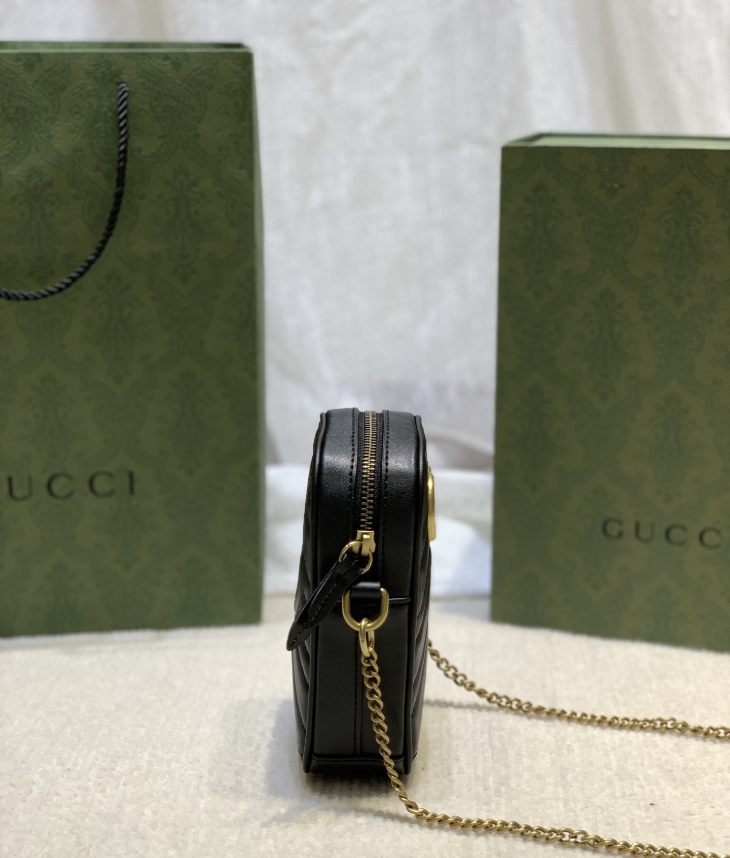GUCCI GG Marmont mini quilted leather pouch