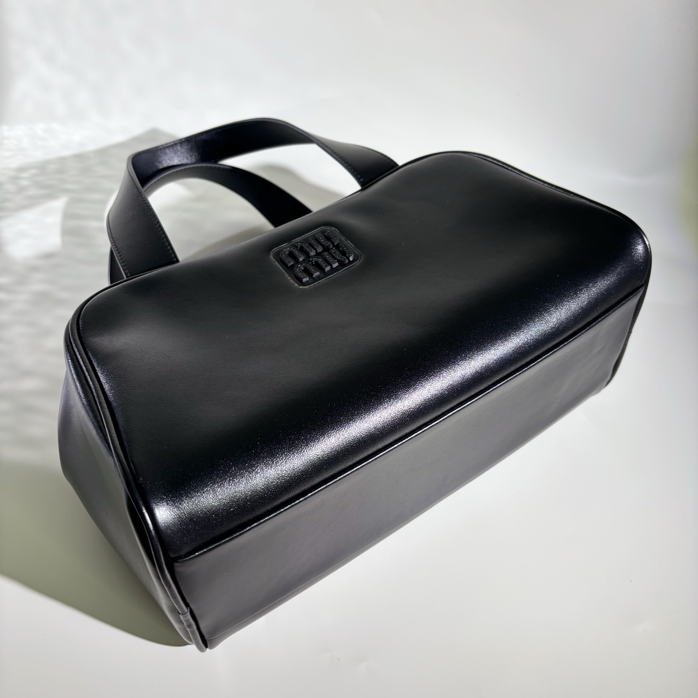 MIUMIU Leather top-handle bag