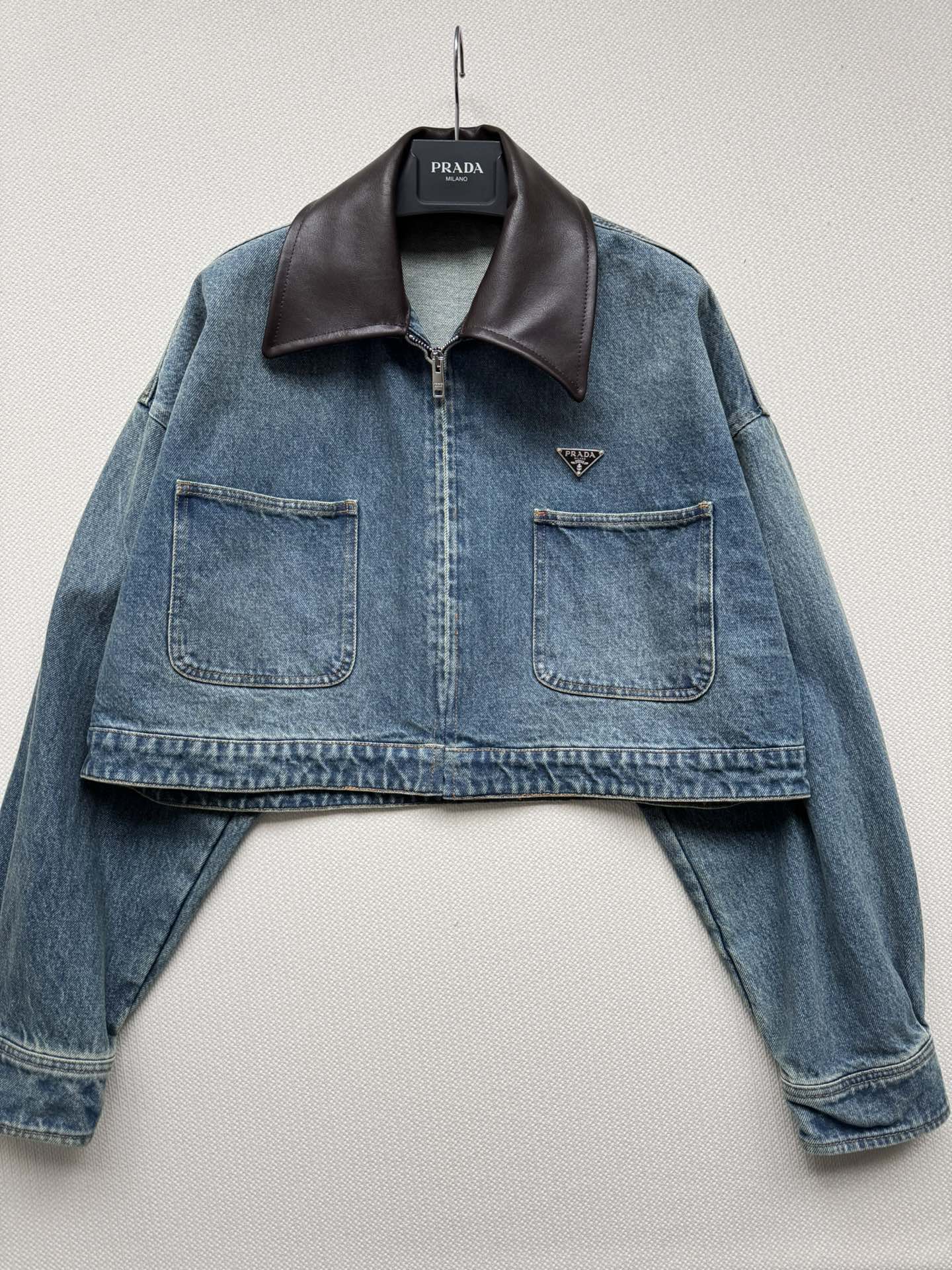 Prada Cropped leather-trimmed denimjacket in blue