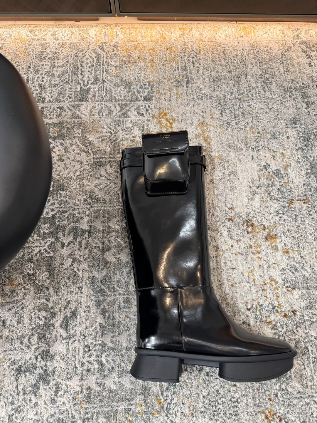 Prada Brushed leather boots with pouch