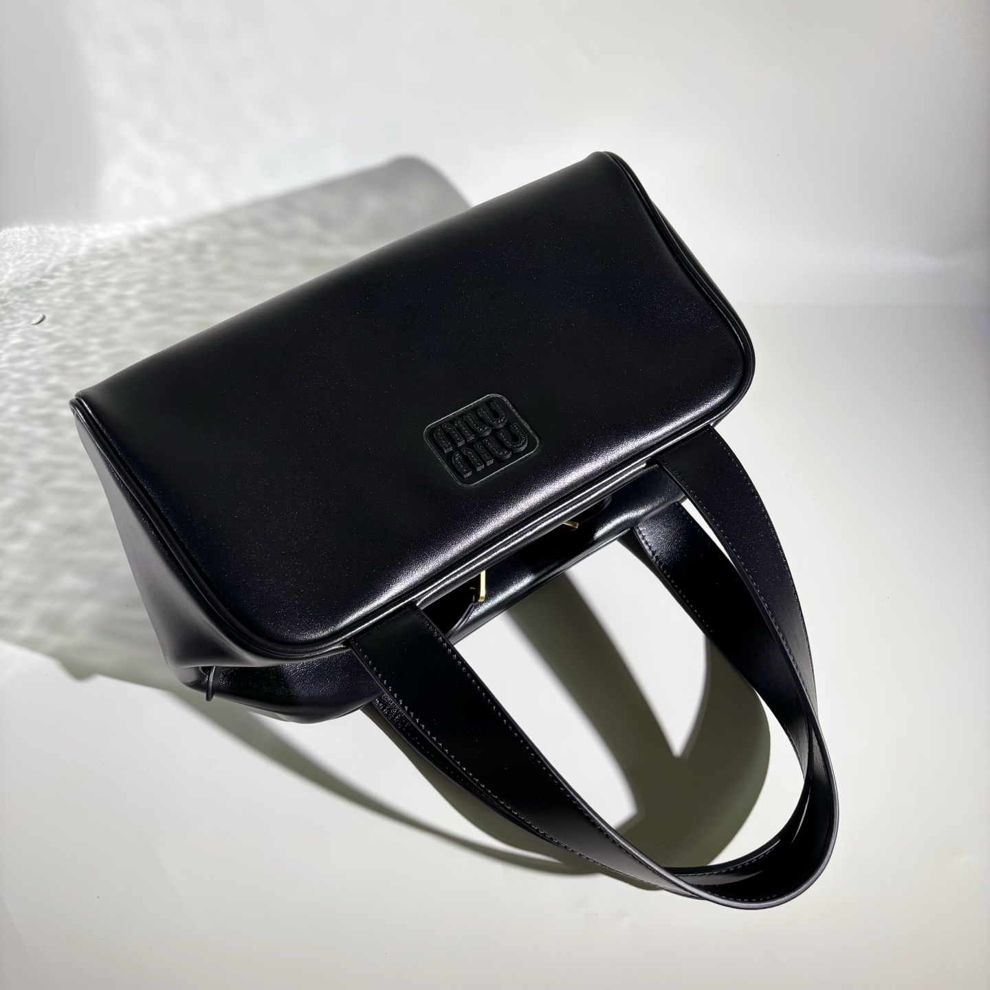 MIUMIU Leather top-handle bag