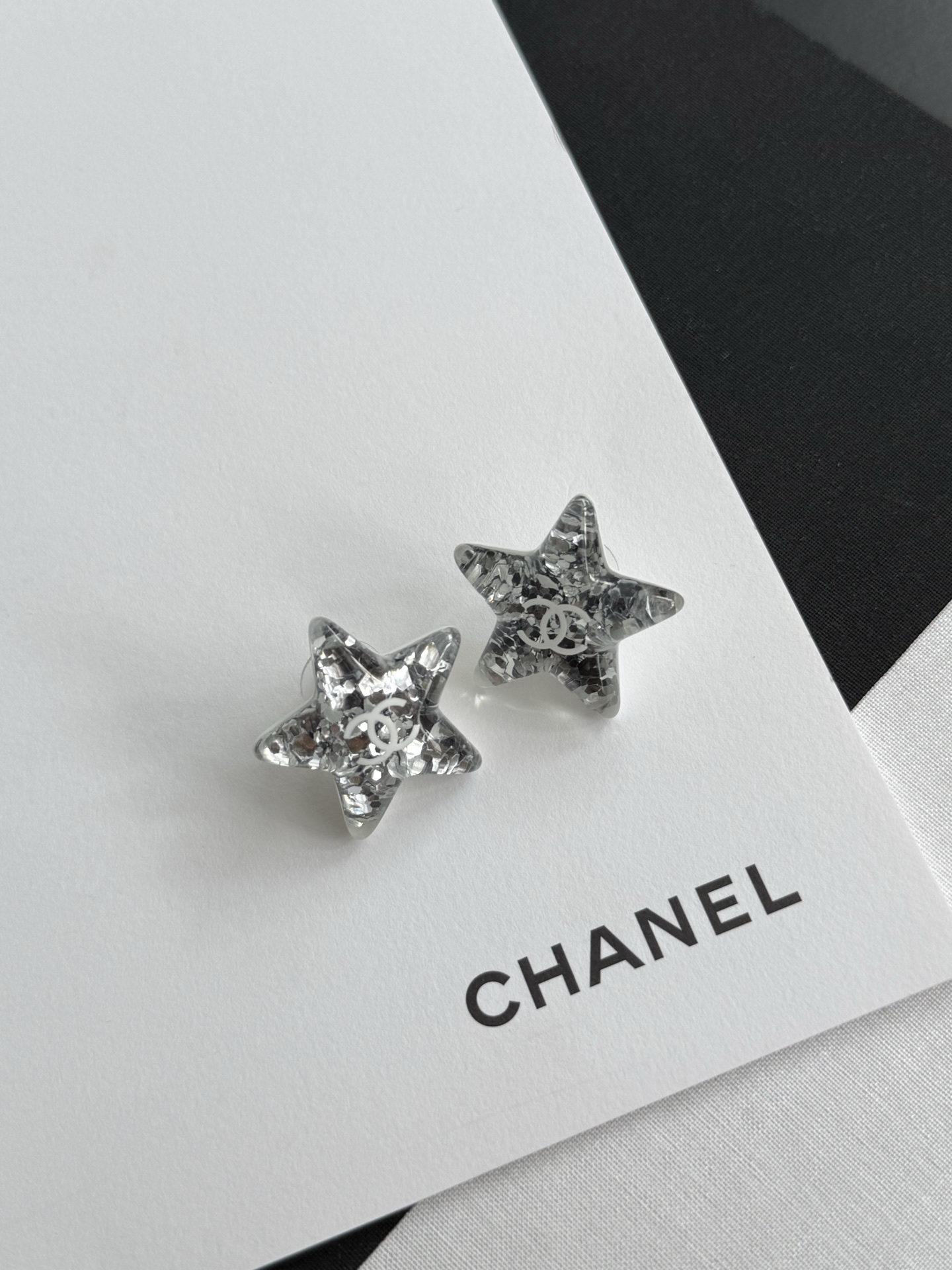 Chanel 25C✨ Acrylic Star Earrings with Silver Glitter CC Logo