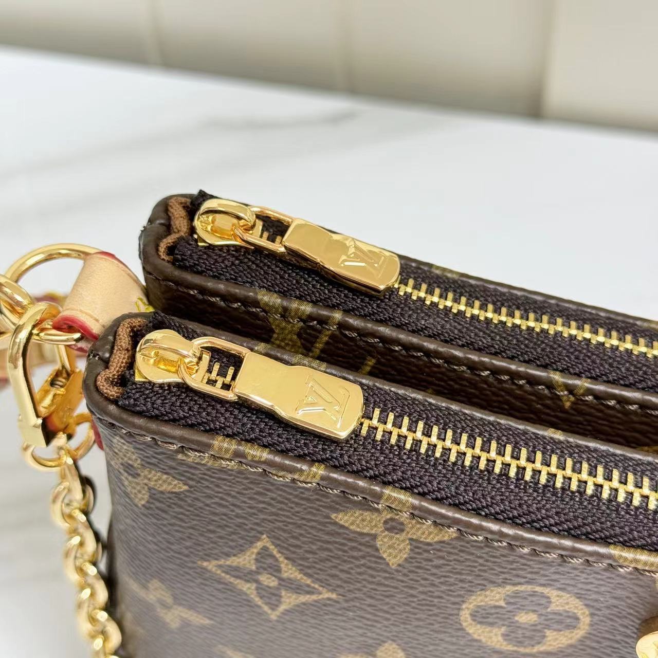 Louis Vuitton Monogram M83008 Liv Pochette