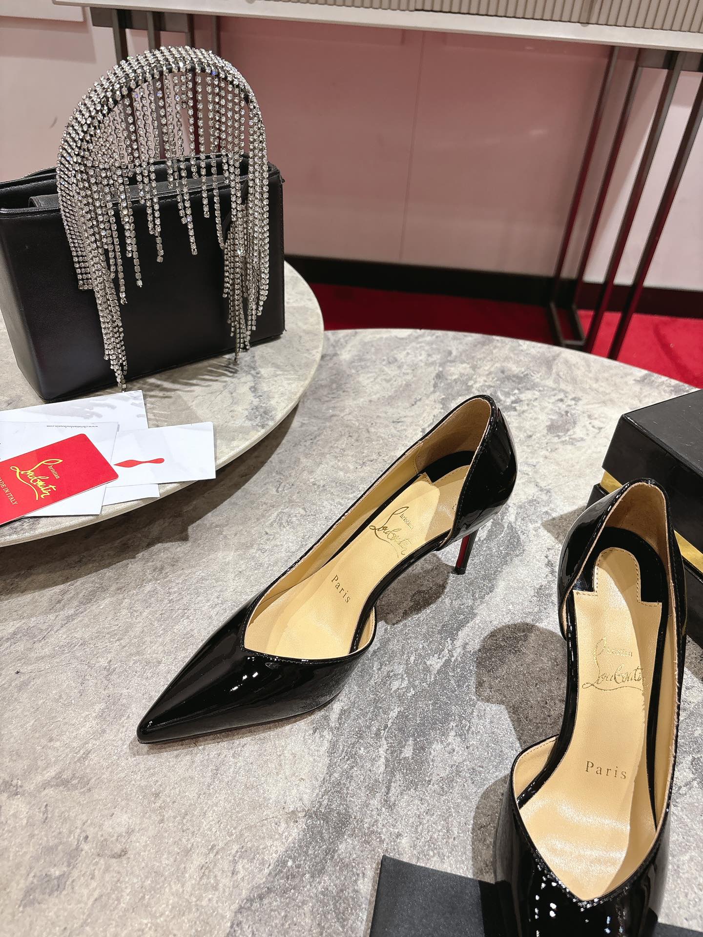CHRISTIAN LOUBOUTIN Iriza patent-leather pumps