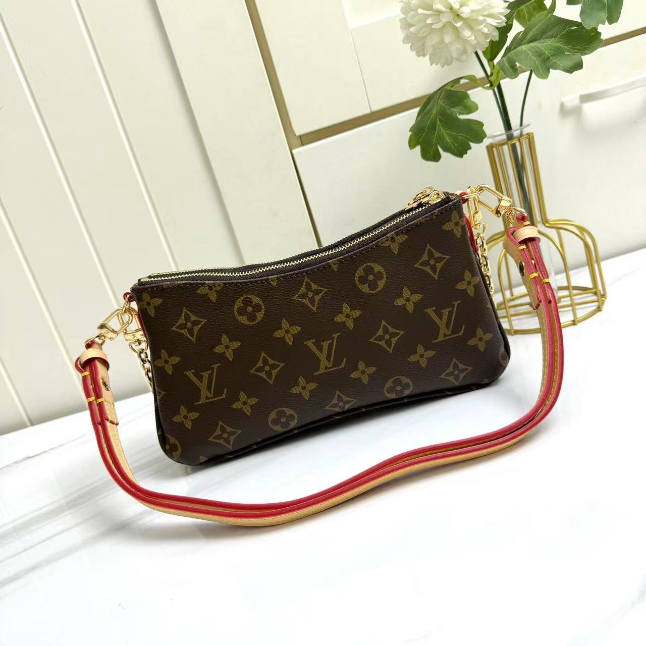 Louis Vuitton Monogram M83008 Liv Pochette