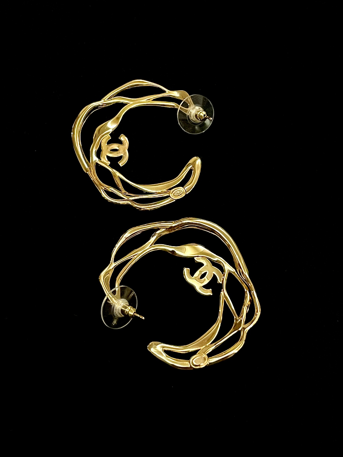 double C perforated earrings with diamond petals