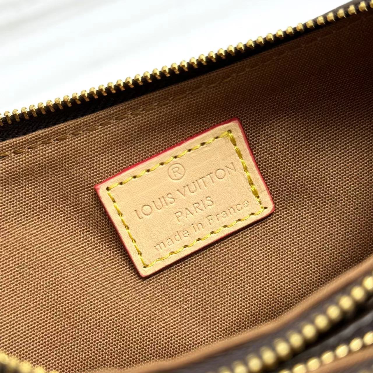 Louis Vuitton Monogram M83008 Liv Pochette