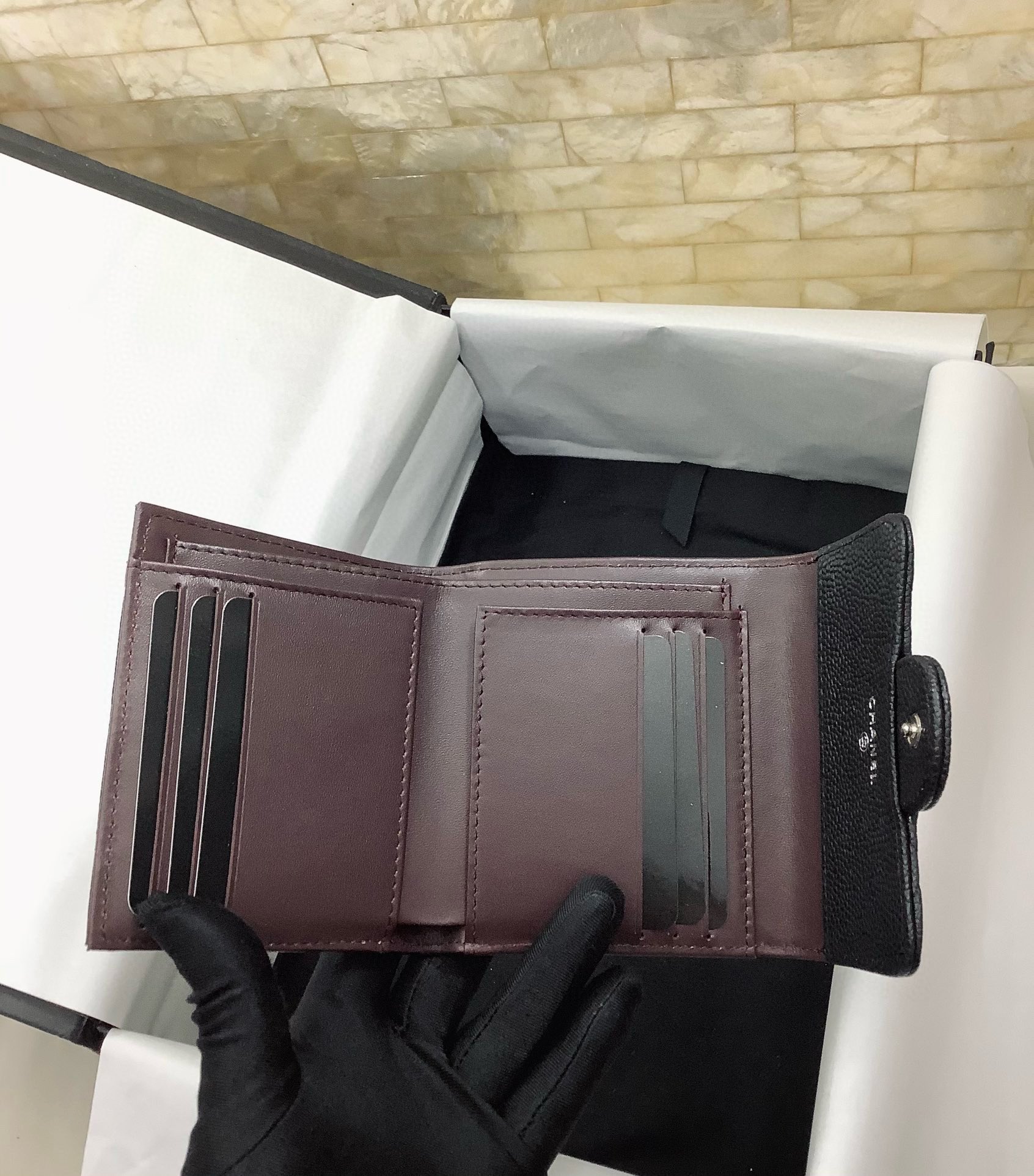 CHANEL Pebbled Leather Tri-Fold Wallet