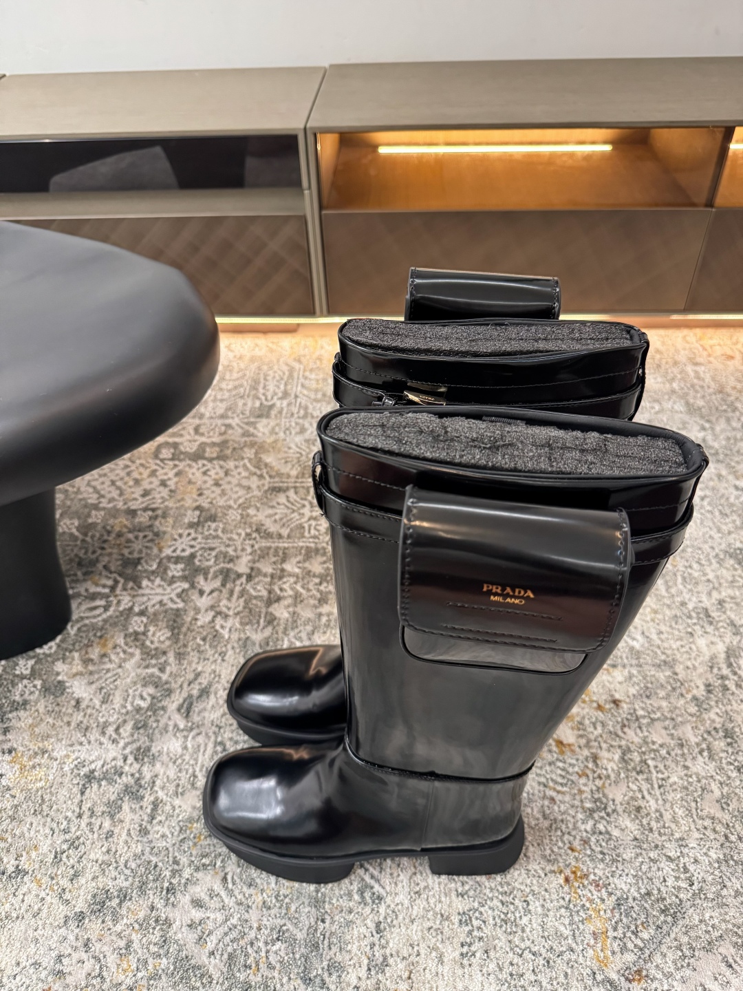 Prada Brushed leather boots with pouch