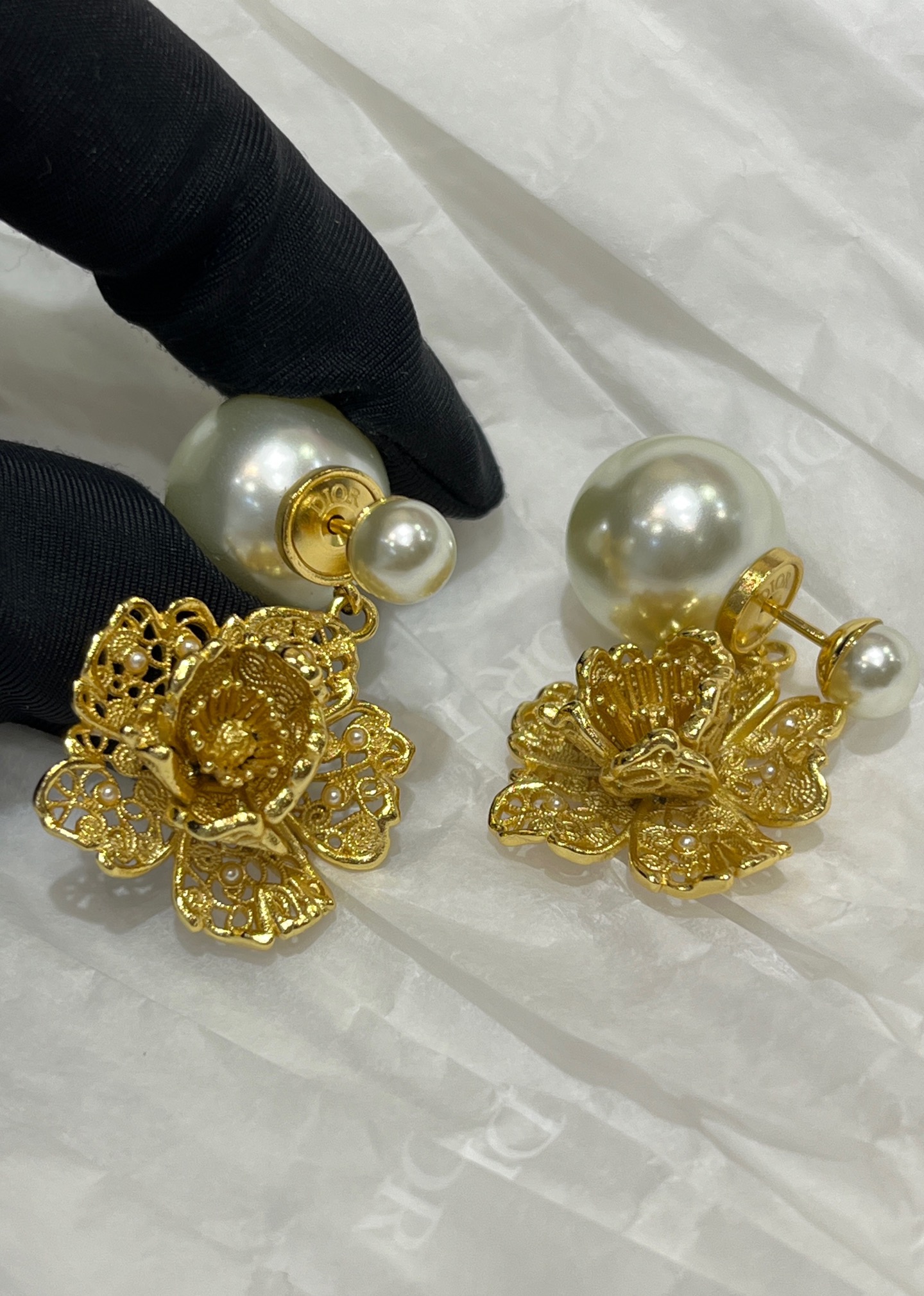 Dior Hollow peony pearl double ball earrings