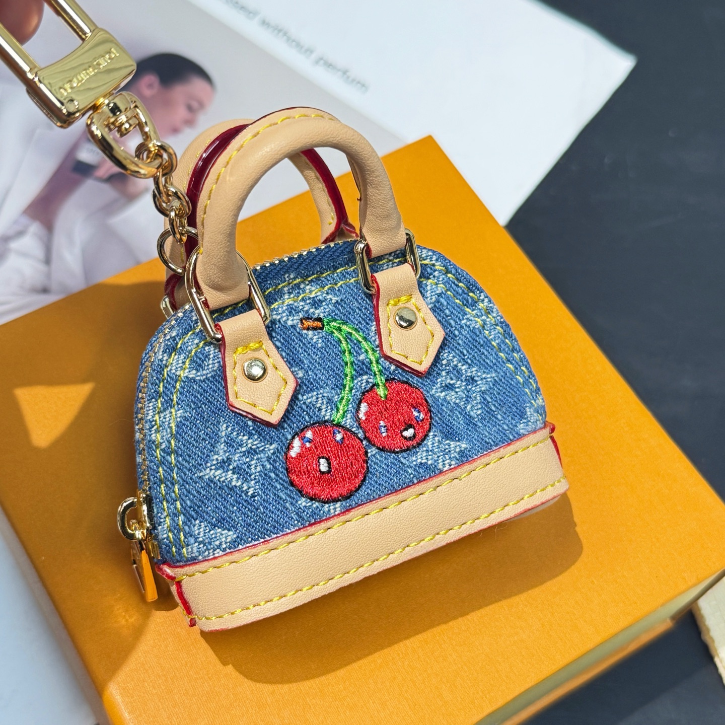 M02535 LV x TM Micro Denim Cerise Bag Charm