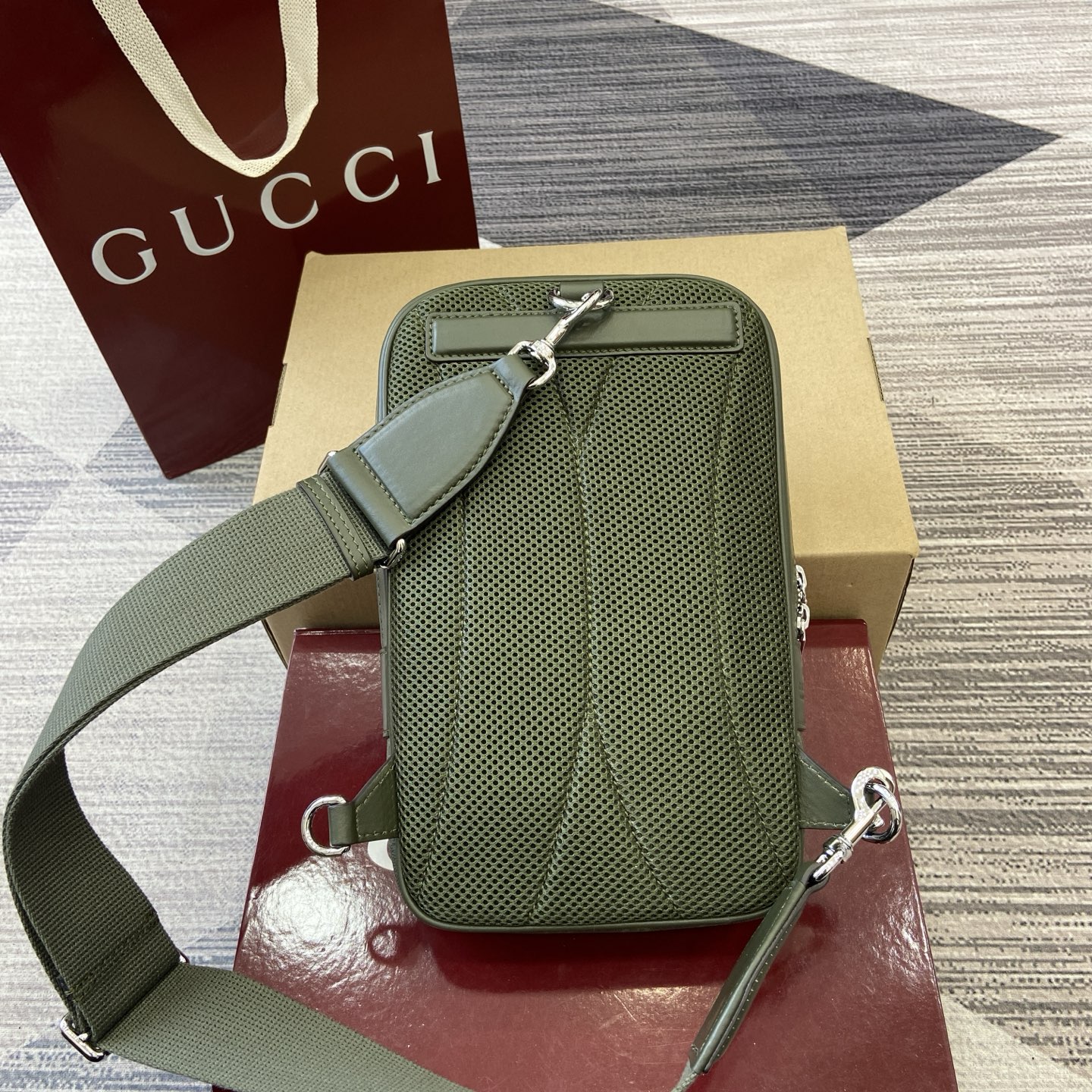 Gucci GG Monogram small slingbag