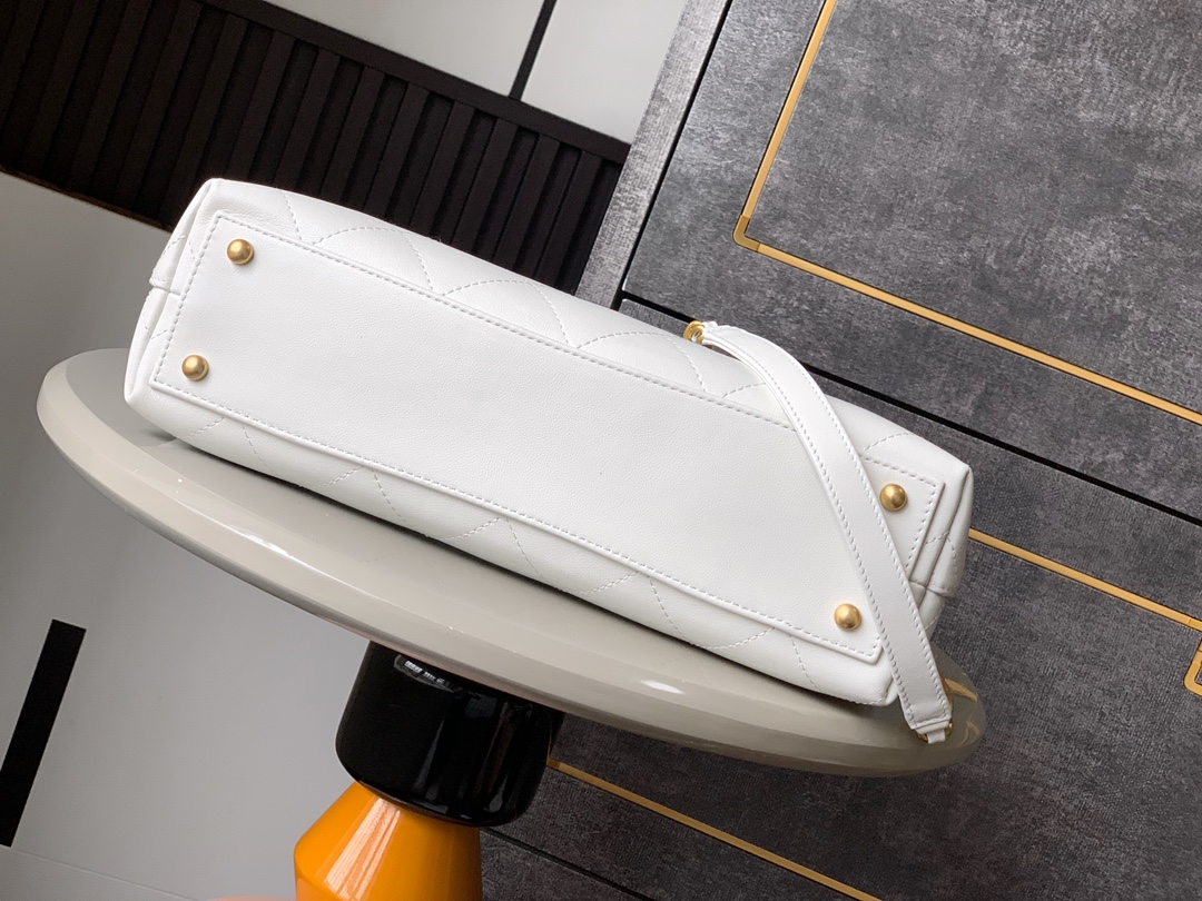 CHANEL Maxi Flap Bag With Top Handle