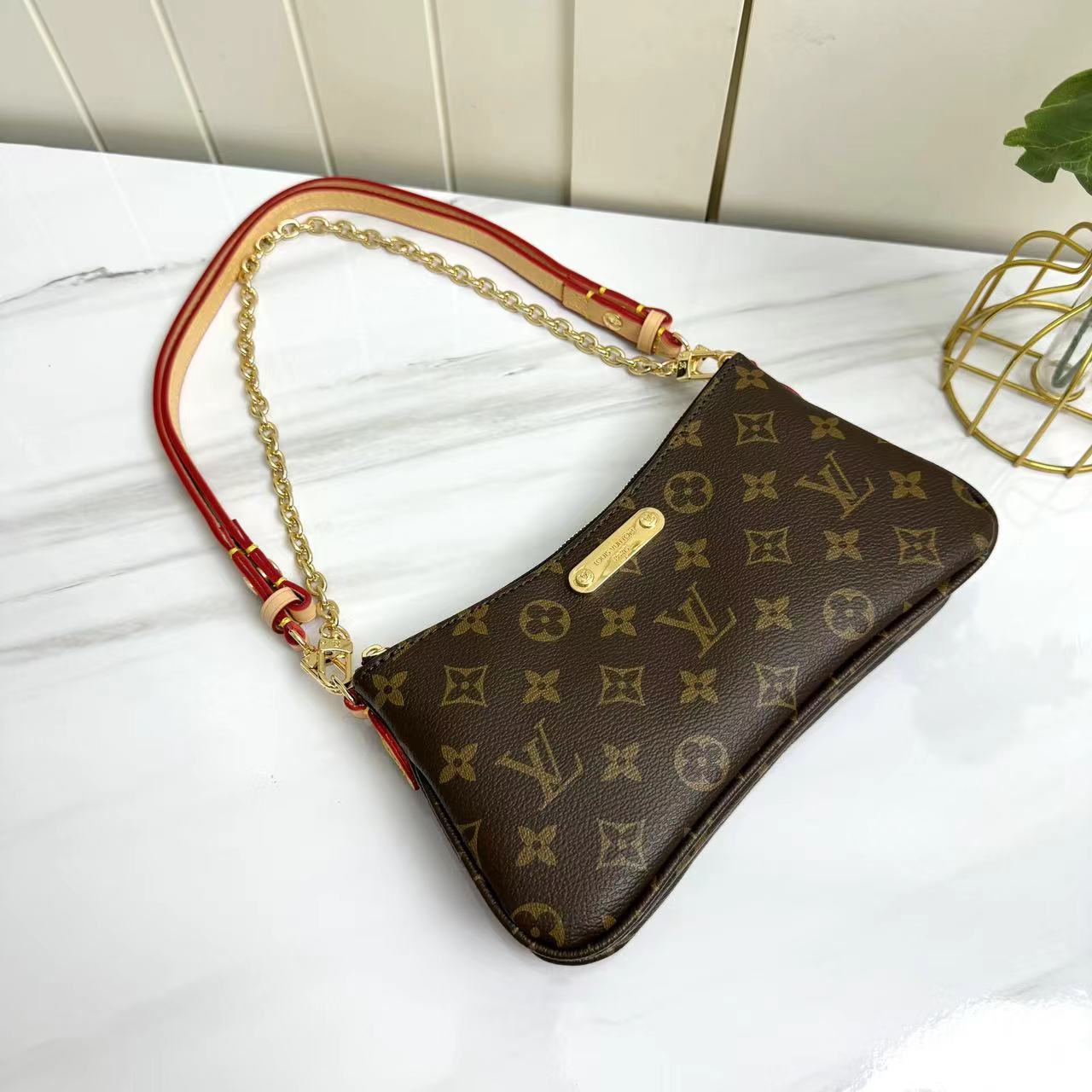 Louis Vuitton Monogram M83008 Liv Pochette