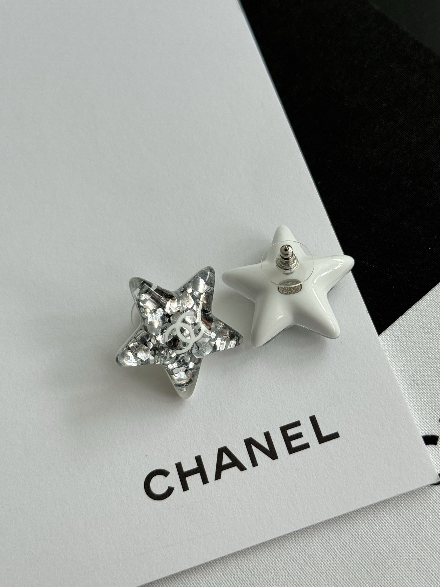 Chanel 25C✨ Acrylic Star Earrings with Silver Glitter CC Logo