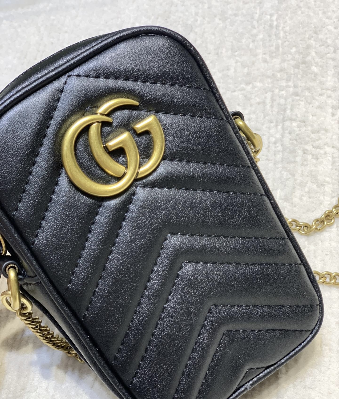 GUCCI GG Marmont mini quilted leather pouch