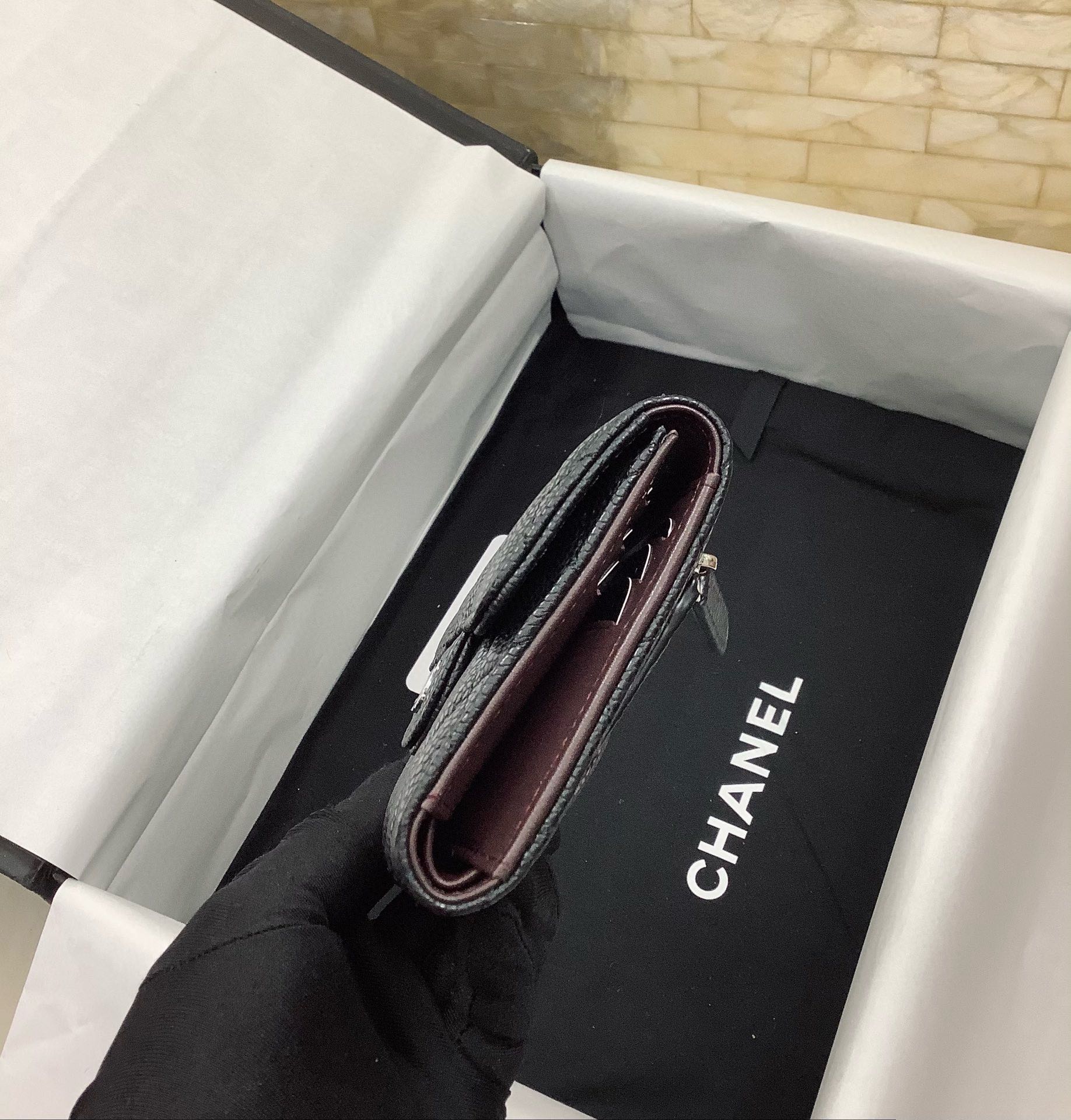 CHANEL Pebbled Leather Tri-Fold Wallet