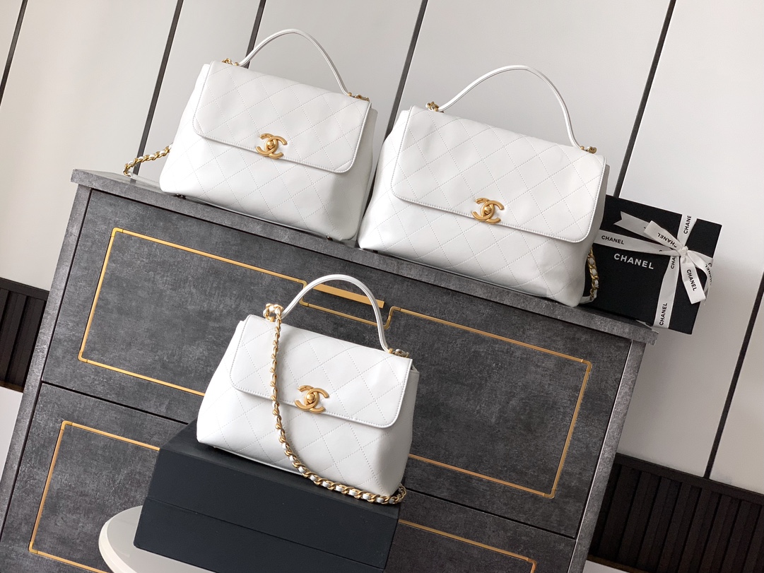 CHANEL Maxi Flap Bag With Top Handle