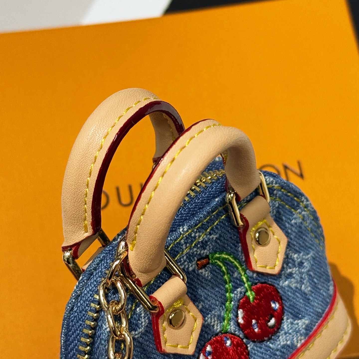 M02535 LV x TM Micro Denim Cerise Bag Charm