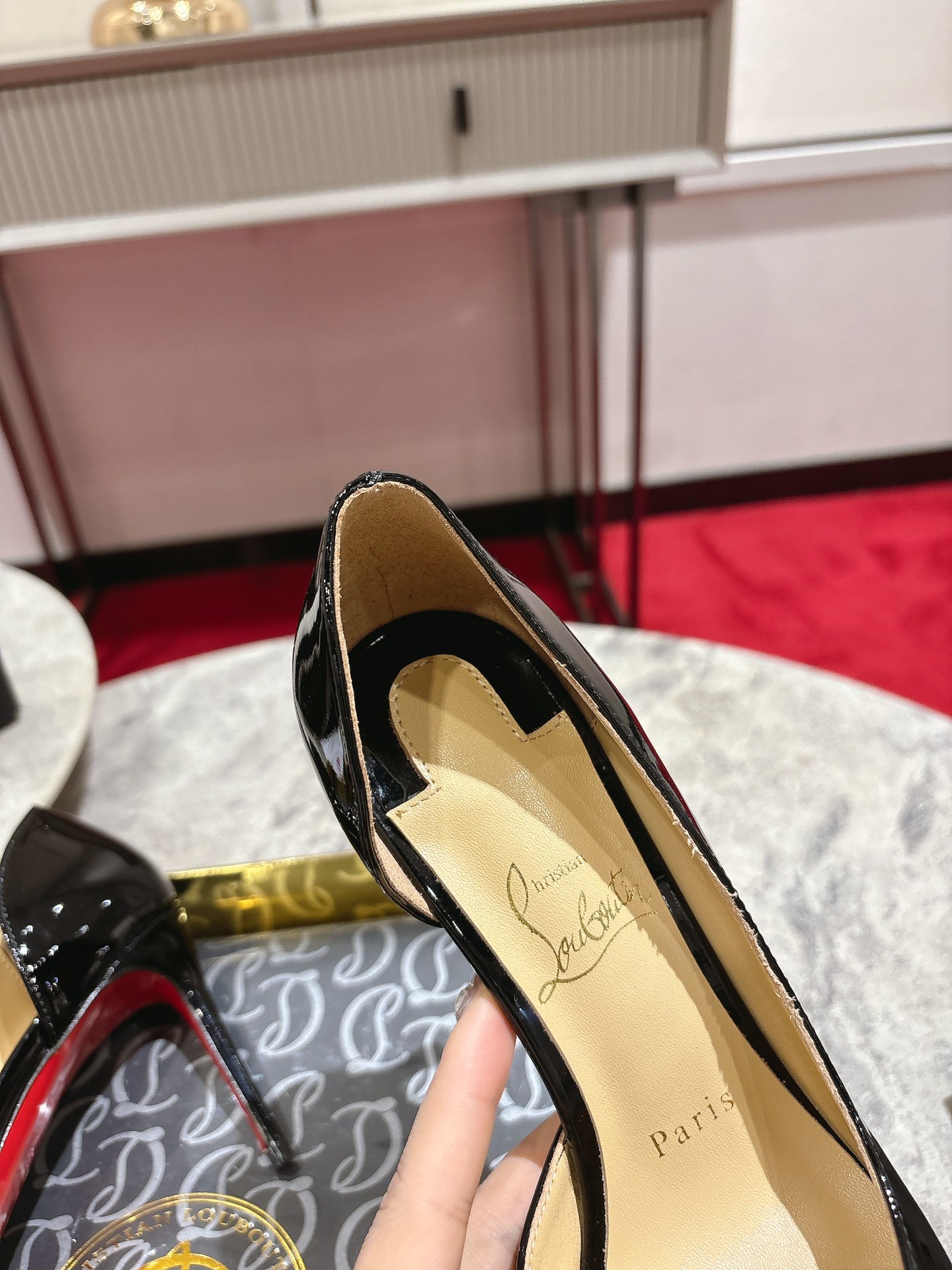 CHRISTIAN LOUBOUTIN Iriza patent-leather pumps
