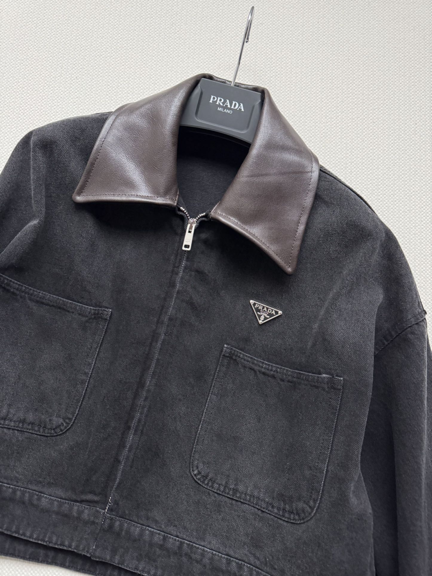 Prada Cropped leather-trimmed denimjacket in blue