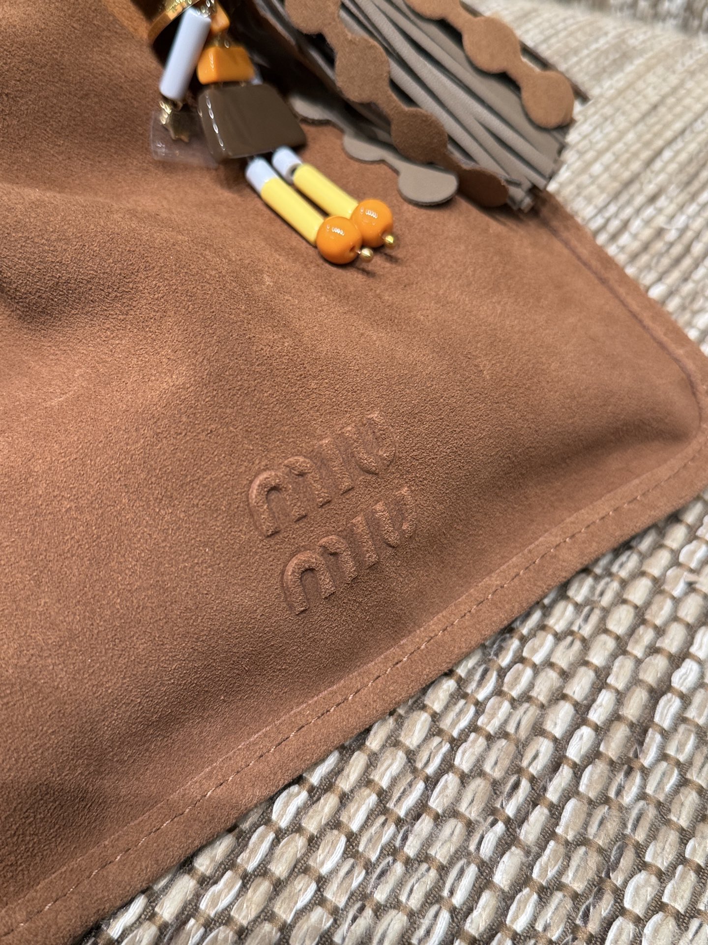 MIUMIU-ROM THE RUNWAY Suede bag with trick