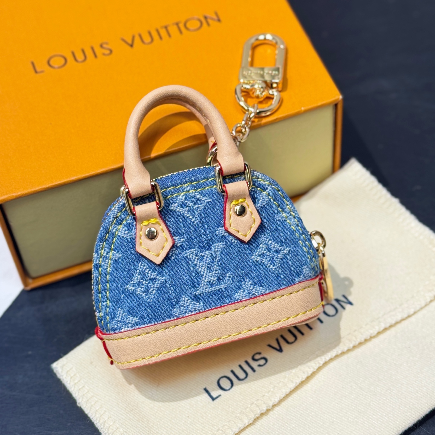M02535 LV x TM Micro Denim Cerise Bag Charm
