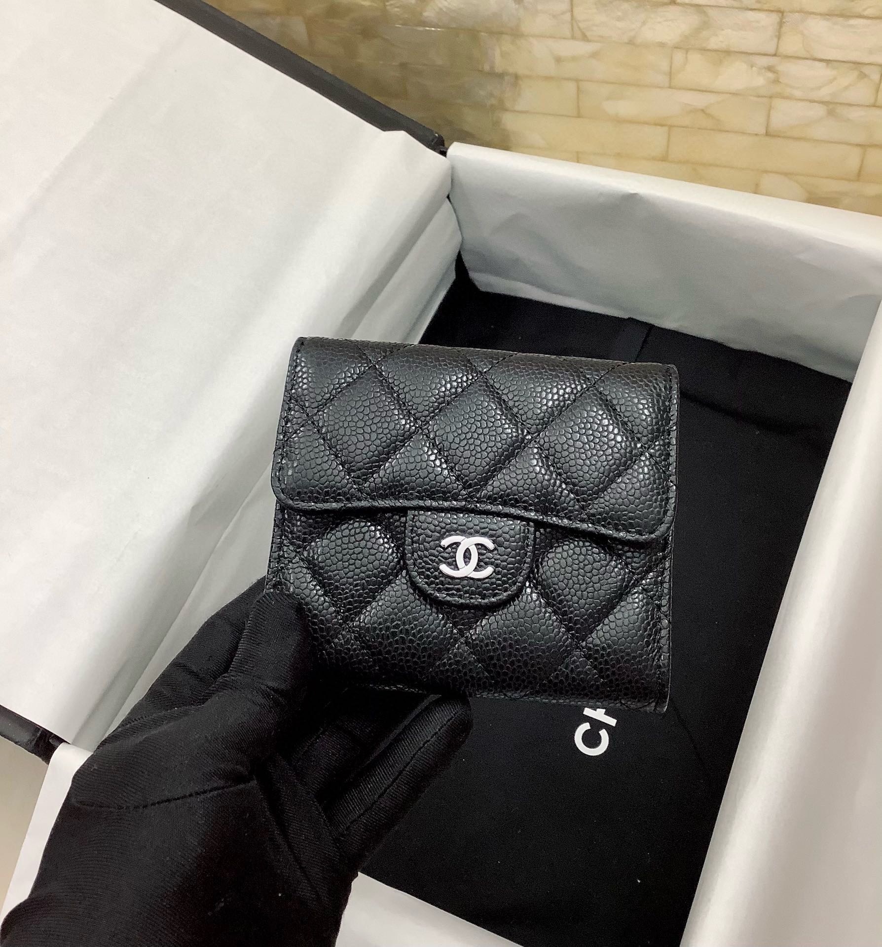 CHANEL Pebbled Leather Tri-Fold Wallet