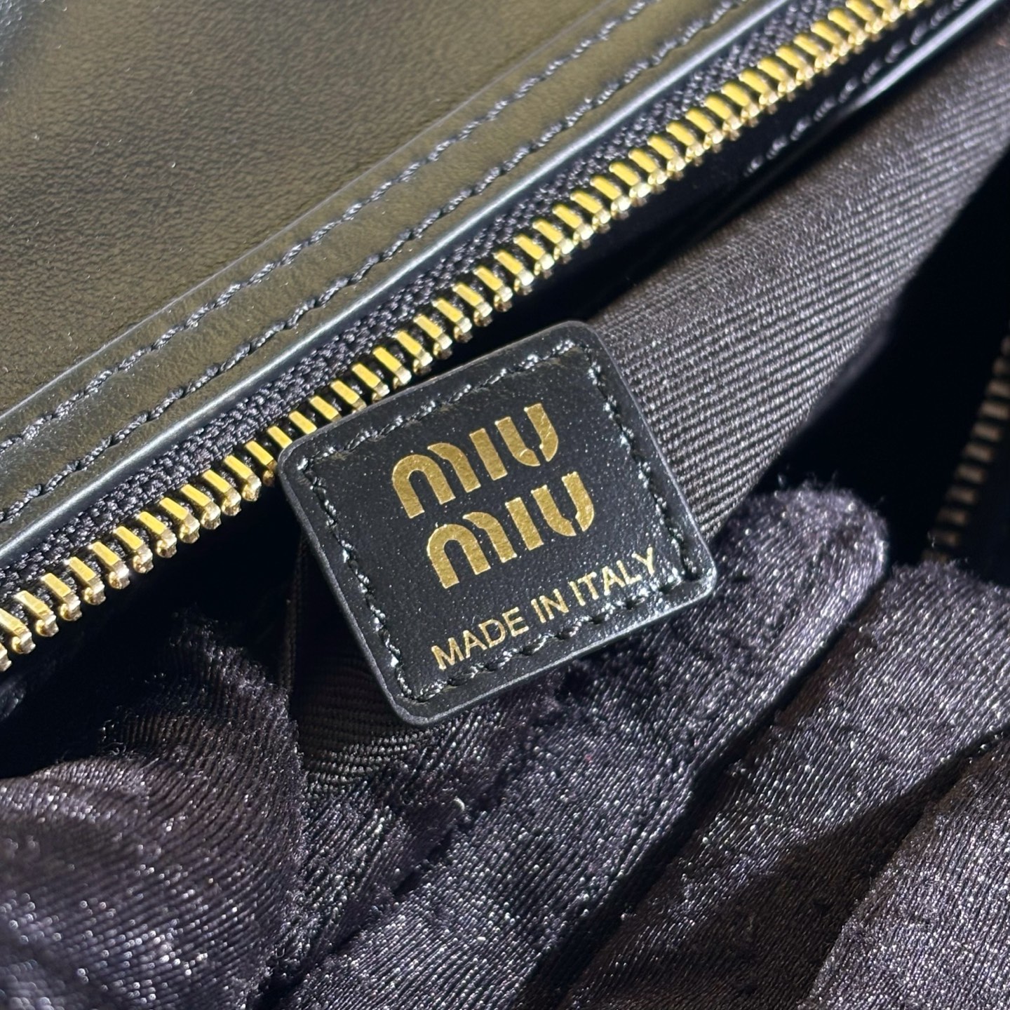 MIUMIU Leather top-handle bag