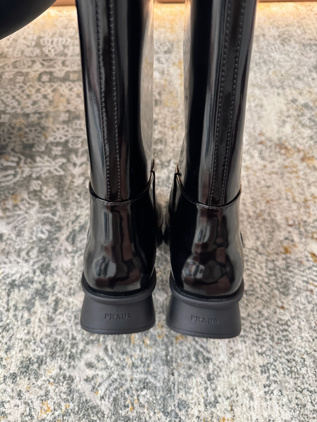 Prada Brushed leather boots with pouch