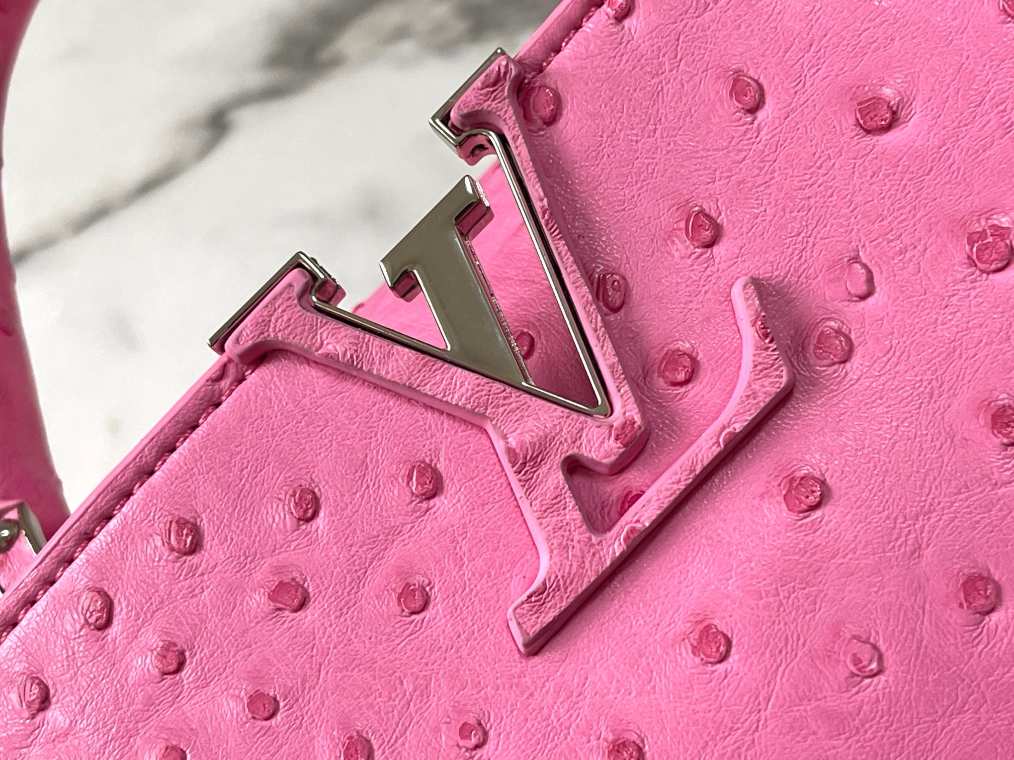 Capucines ostrich leather handbag