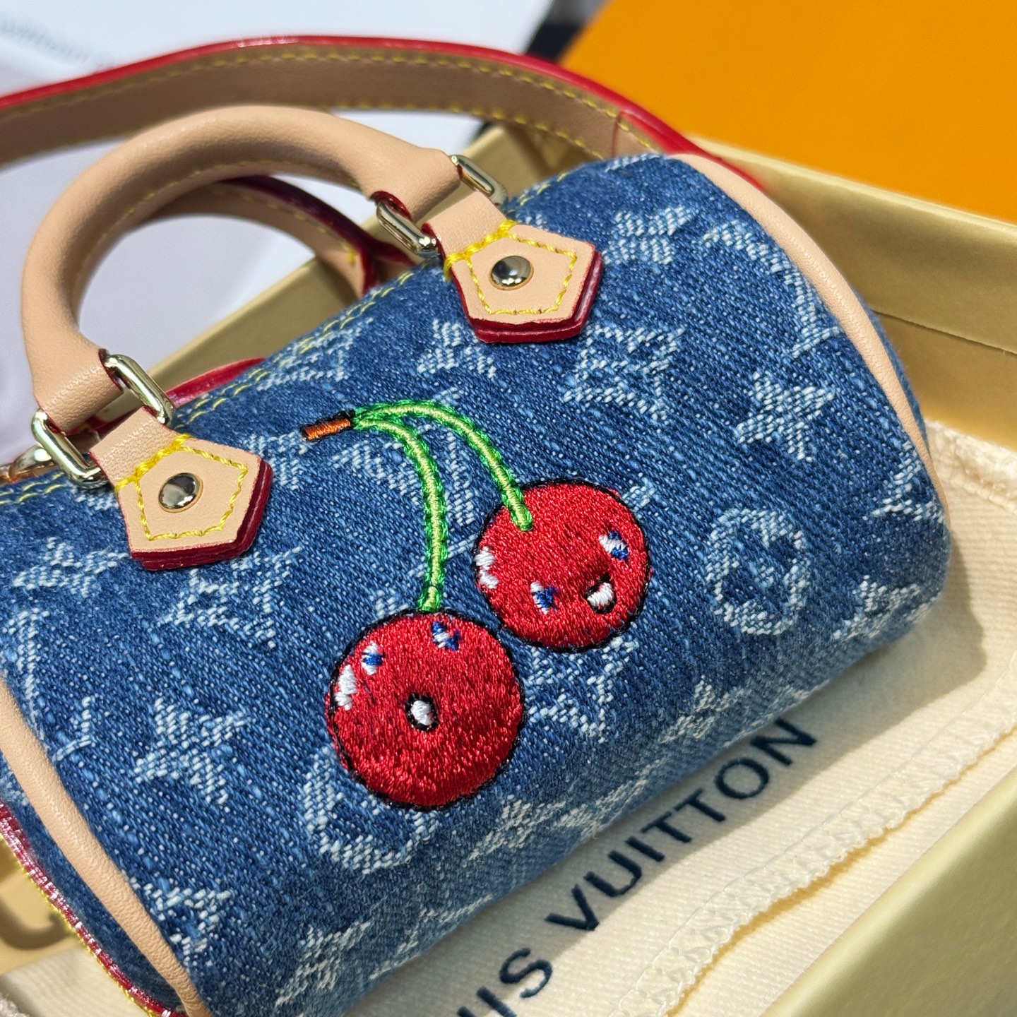 M02535 LV x TM Micro Denim Cerise Bag Charm
