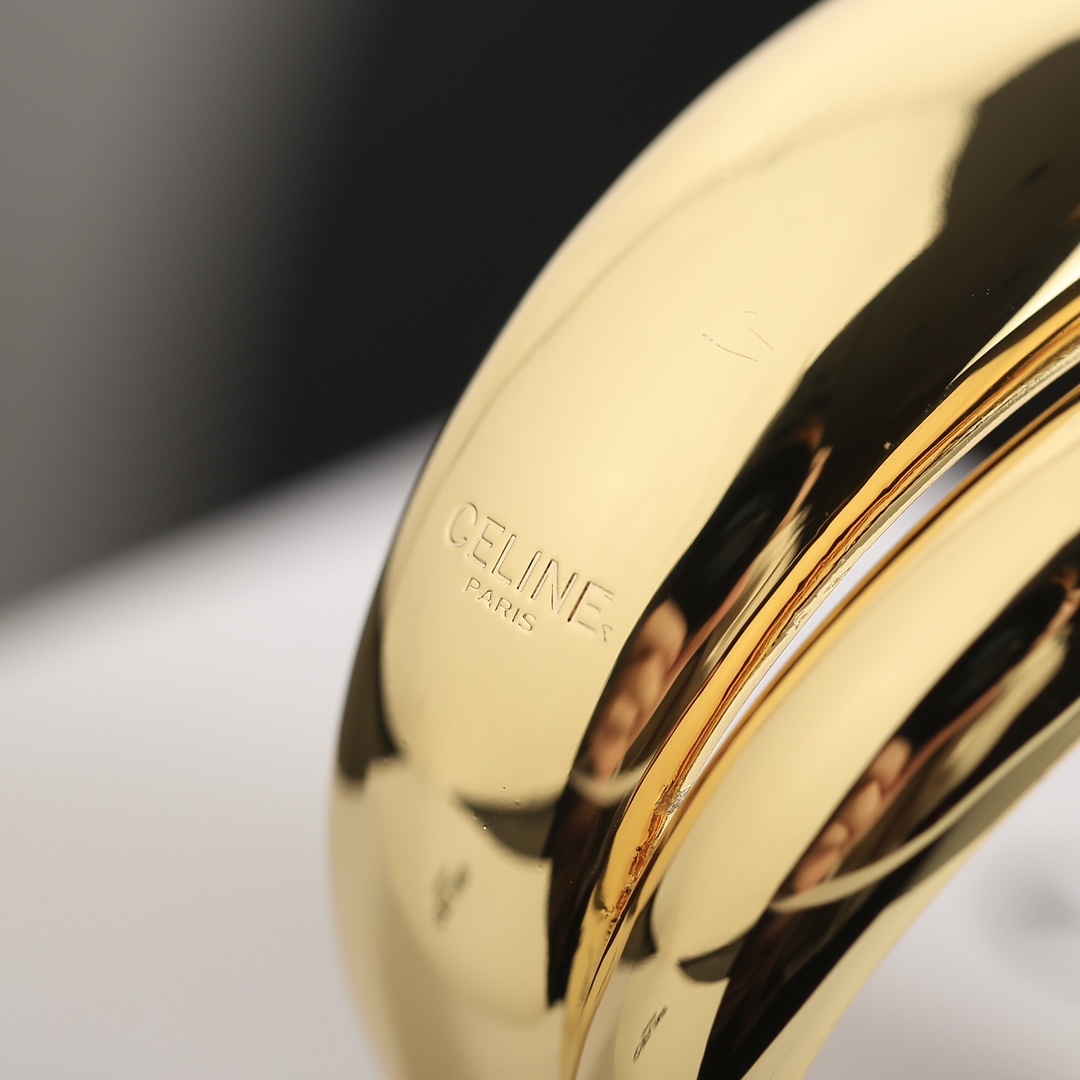 C*eline open earrings