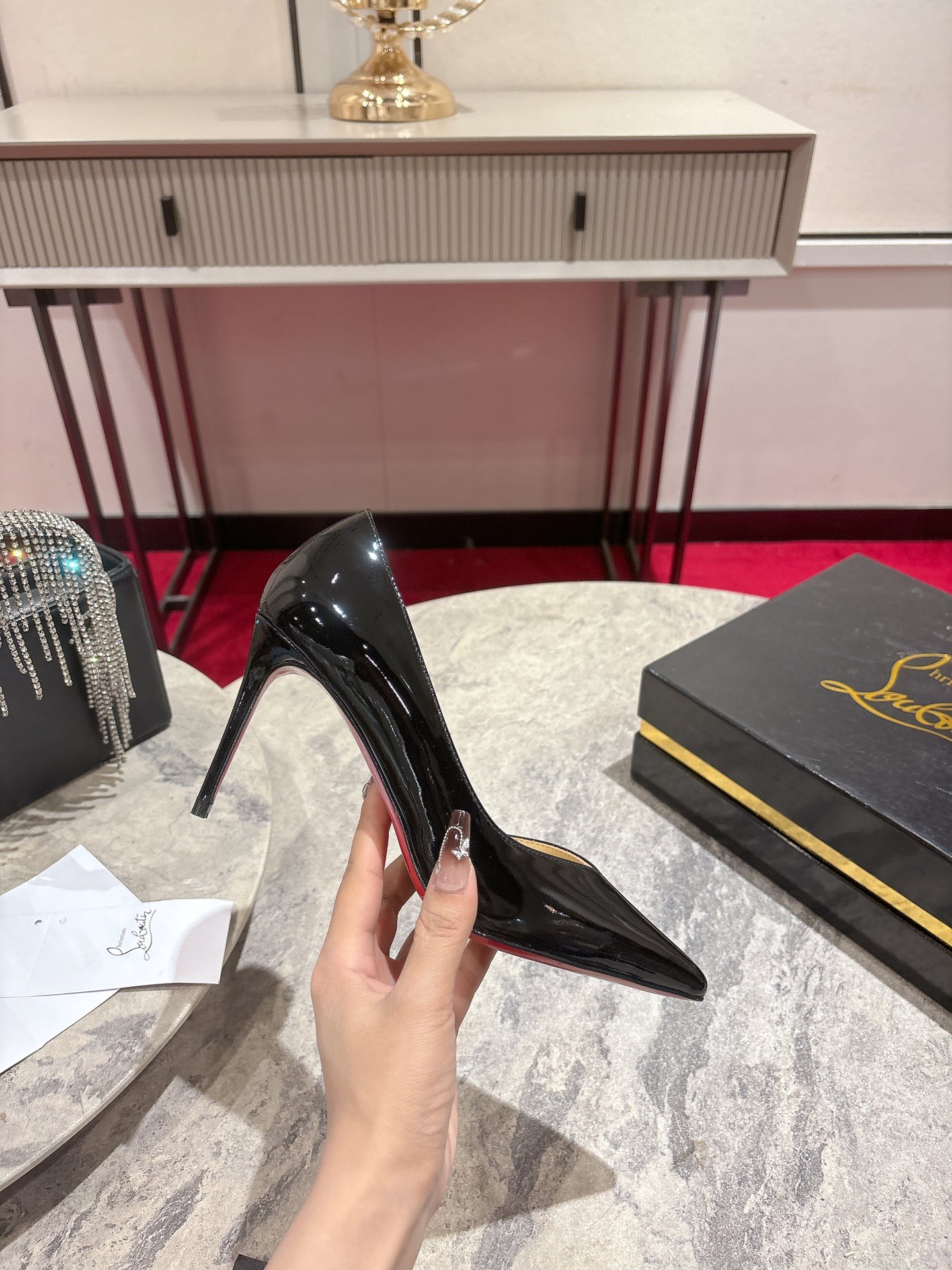 CHRISTIAN LOUBOUTIN Iriza patent-leather pumps
