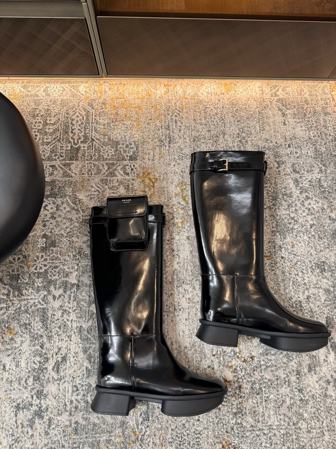 Prada Brushed leather boots with pouch