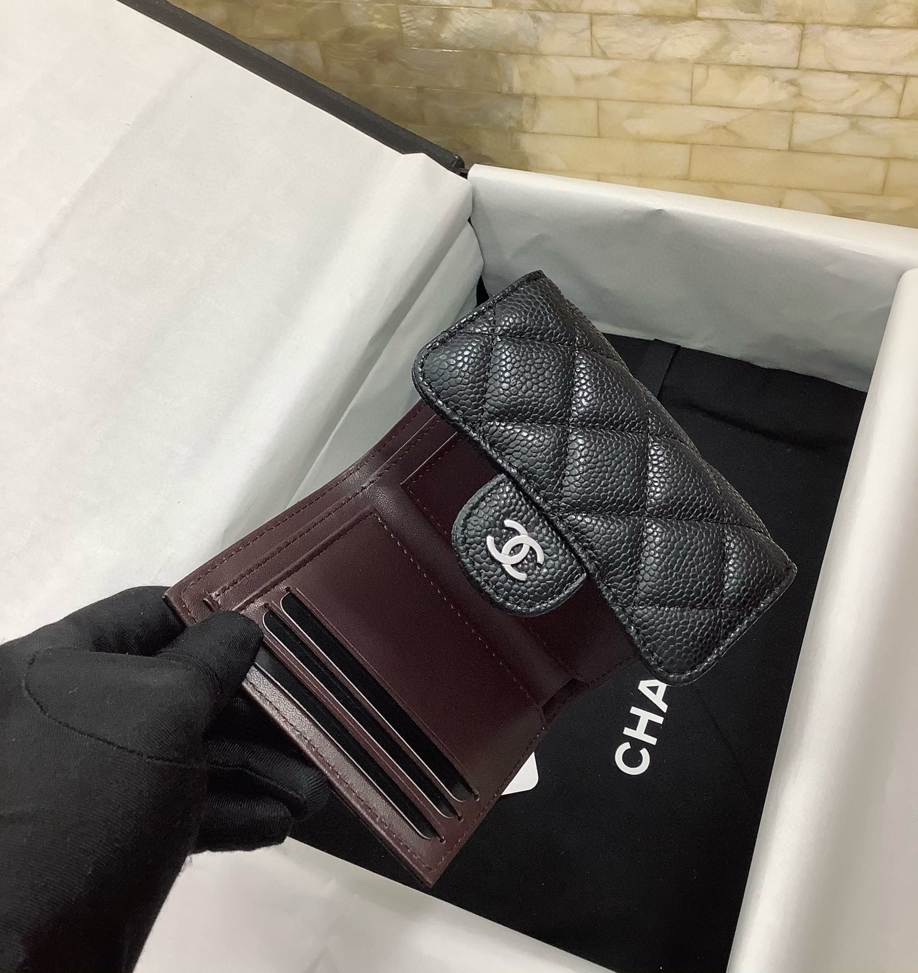 CHANEL Pebbled Leather Tri-Fold Wallet