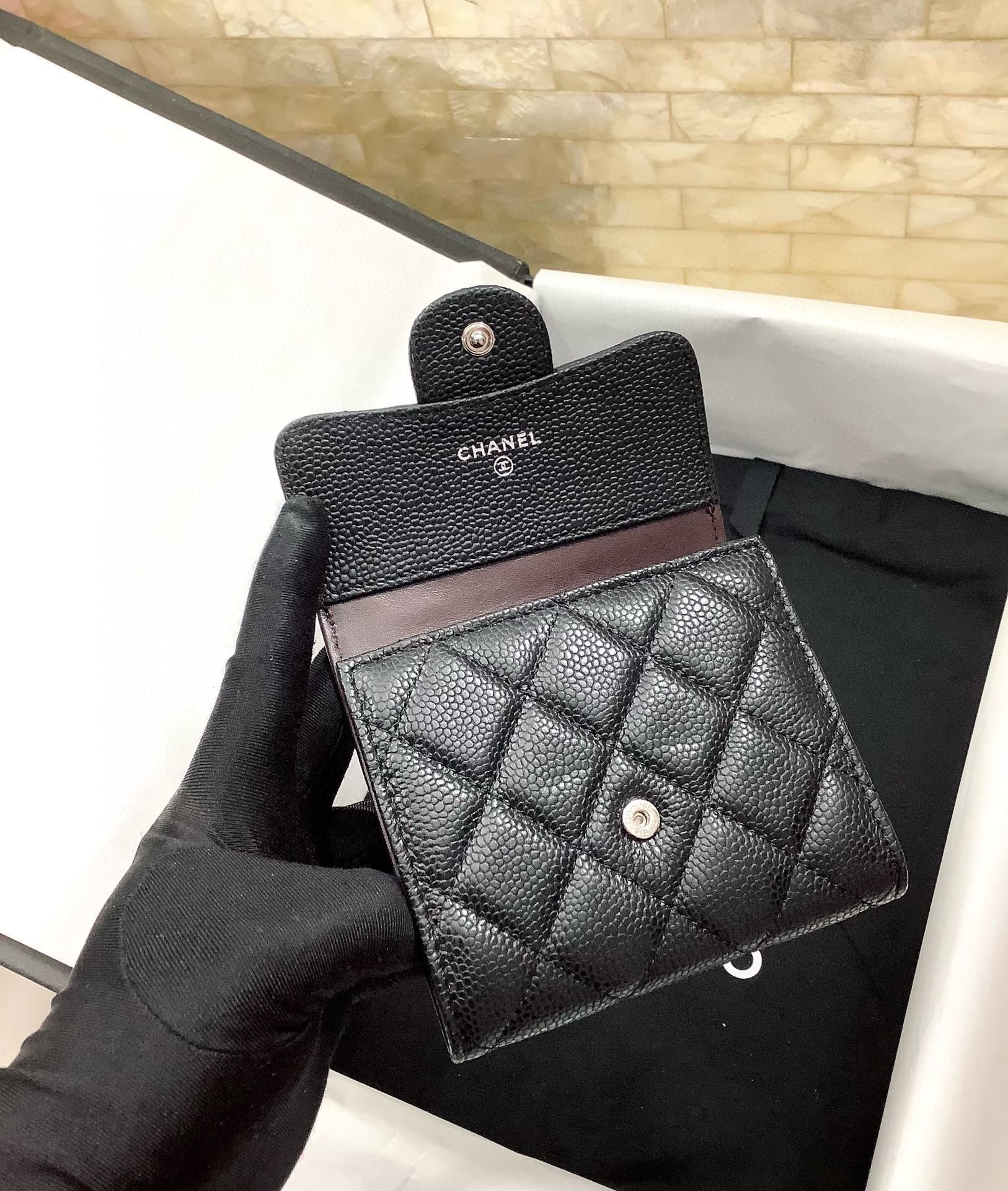 CHANEL Pebbled Leather Tri-Fold Wallet