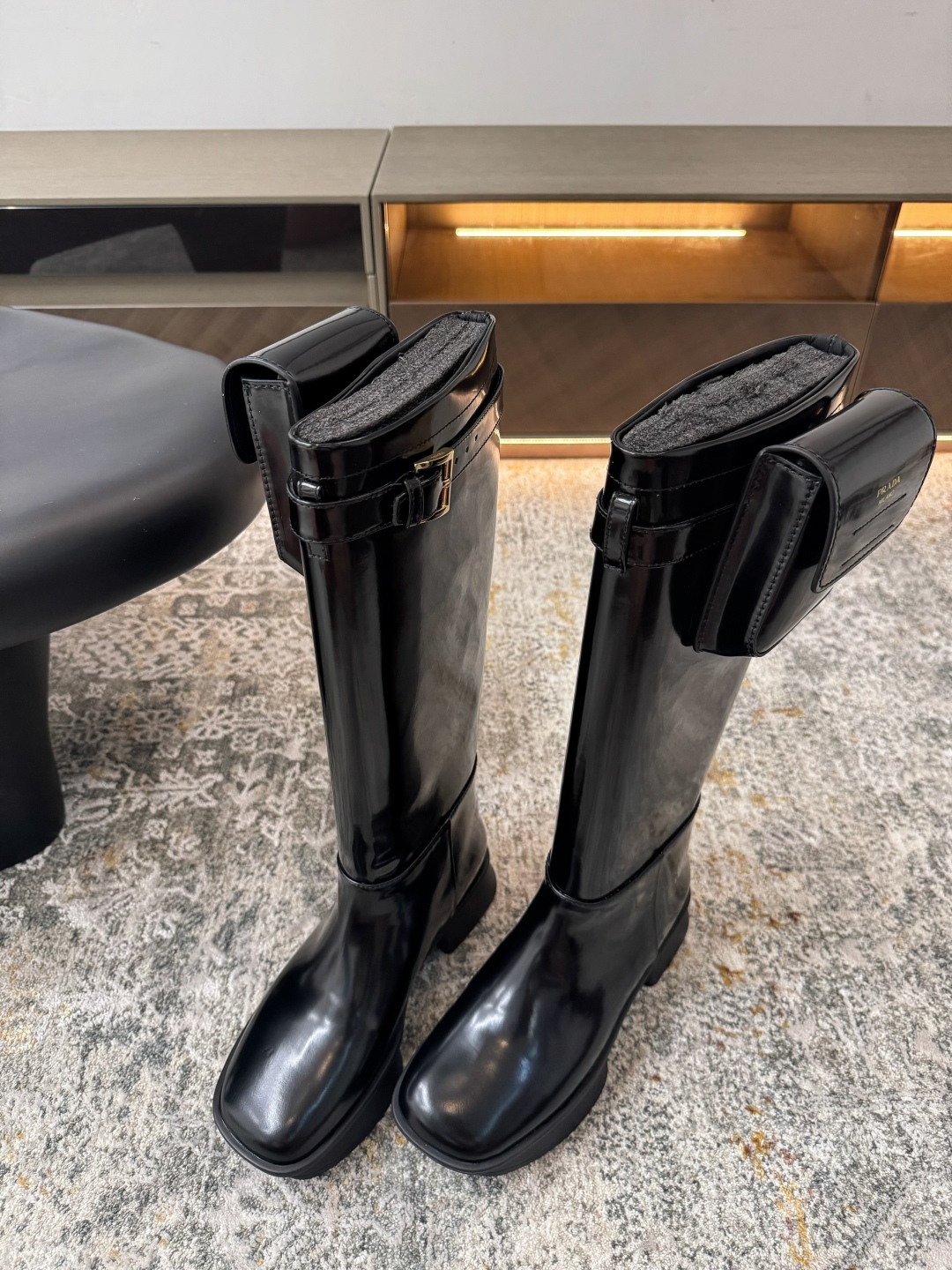 Prada Brushed leather boots with pouch