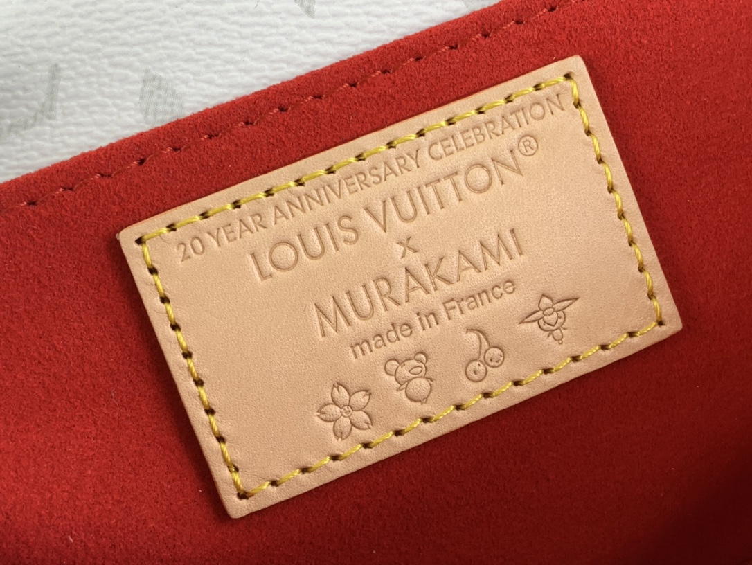 M14231 New LV x TM Pochette Métis East West